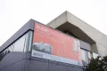 Photo: Outdoor banner with the inscription "RUB60 Campusfeier" at the Music Center