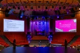 Photo: View into the Great Hall of the Audimax with the Klais organ in the middle and two screens to the left and right of it