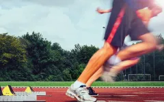 Startblock und Läufer beim Hochschulsport Bochum