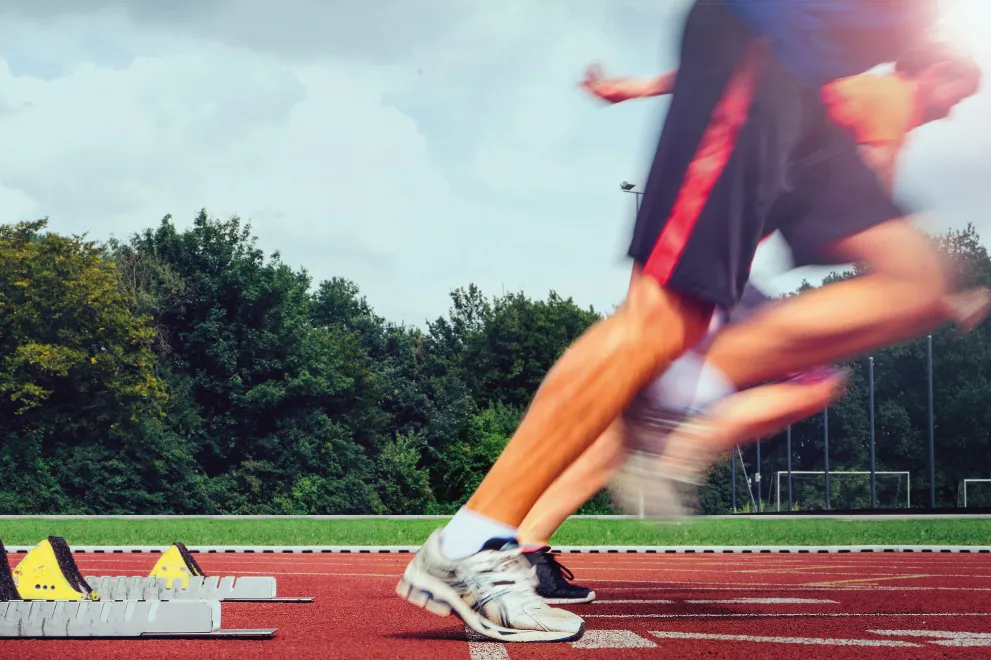 Startblock und Läufer beim Hochschulsport Bochum